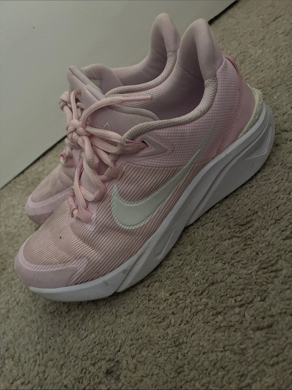 Nike Women's Light Pink Athletic Sneakers with White Swoosh